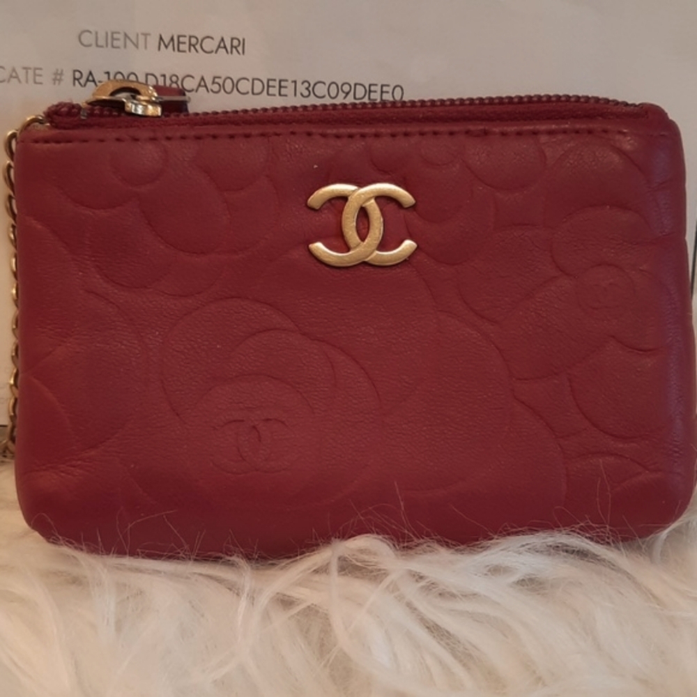 Chanel lambskin camellia embossed keyholder/pouch